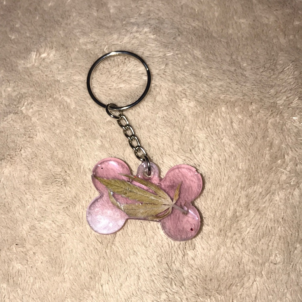 Custom epoxy mini bone 🦴 keychain with my favorite leaf and one wish